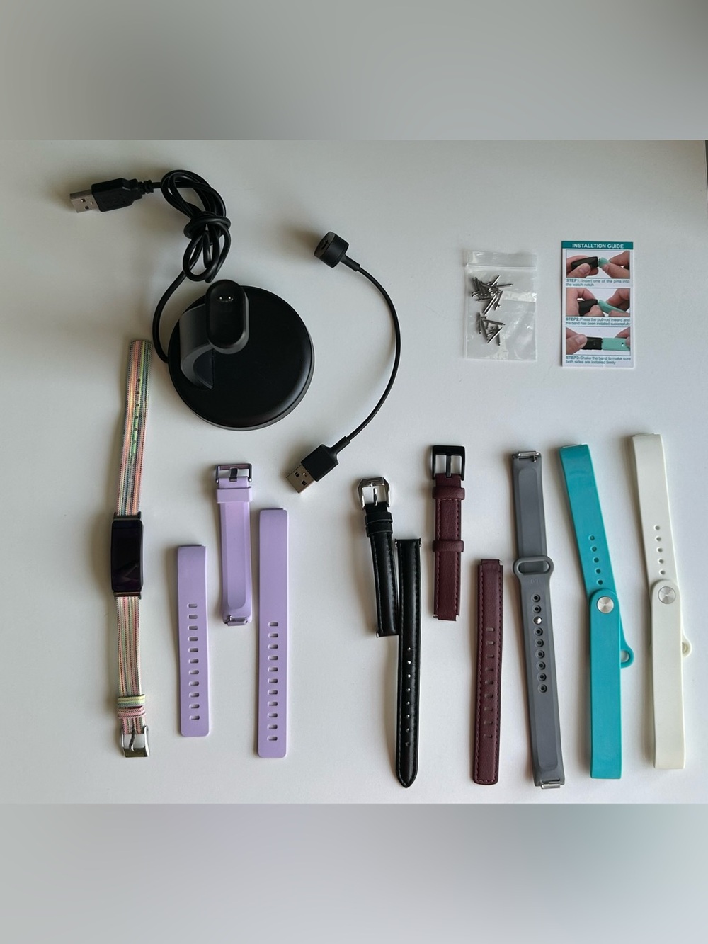Fitbit Inspire HR with 2 chargers and 7 wrist bands - works!